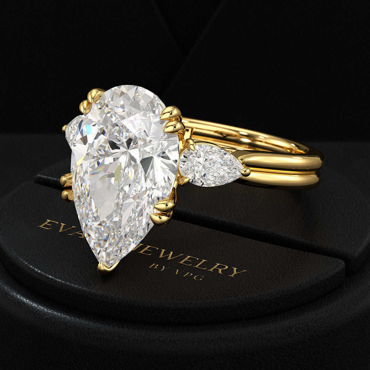 7 Carat Pear Cut Diamond Three Stone Ring with Accent Pear Diamonds