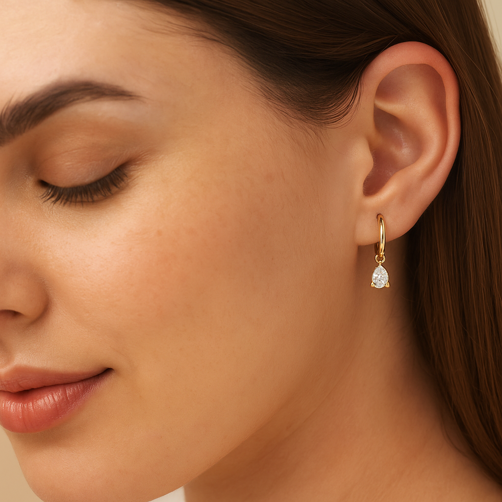 Elegant hoop earrings with 1 carat pear cut lab diamonds