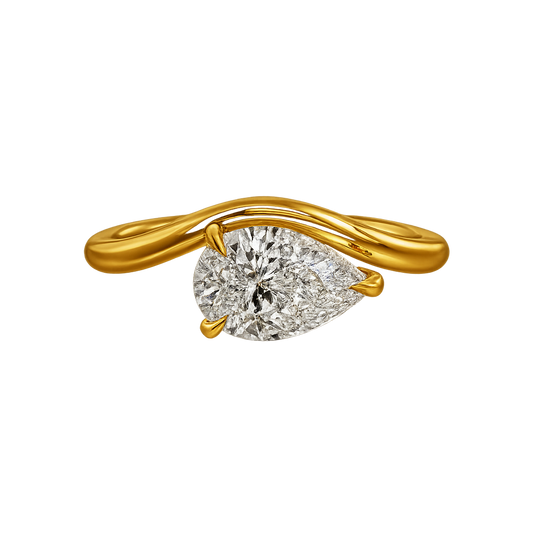 Gold east west ring with a pear-shaped diamond