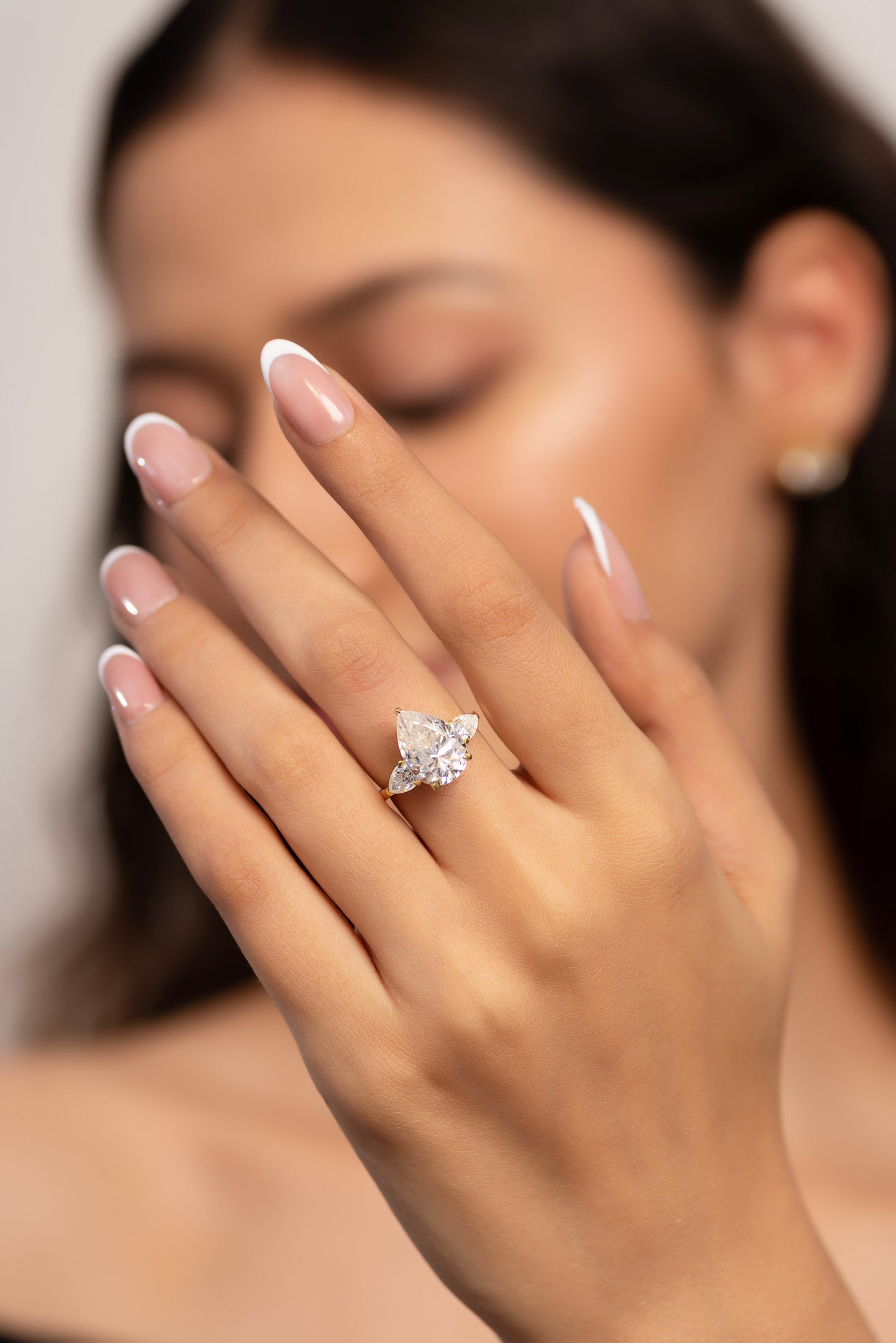 7 Carat Pear Cut Diamond Three Stone Ring with Accent Pear Diamonds