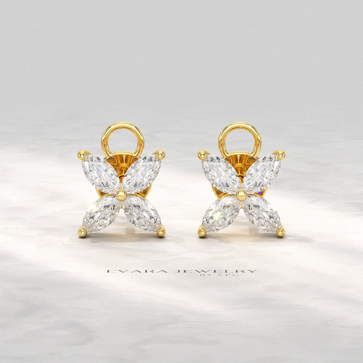 "Eco-friendly floral studs with sustainable marquise cut diamonds"