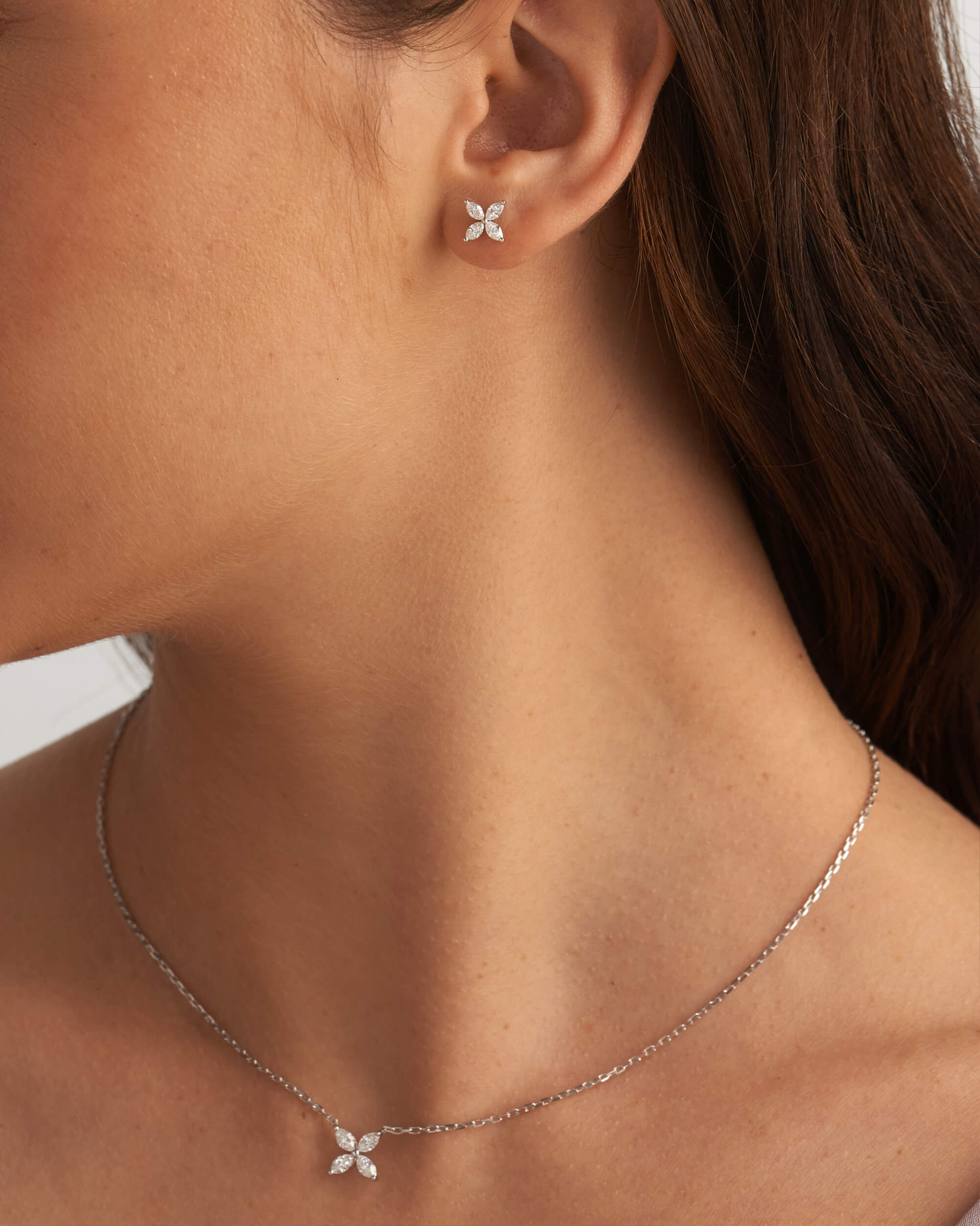 "Elegant flower-shaped earrings with marquise lab-grown diamonds"