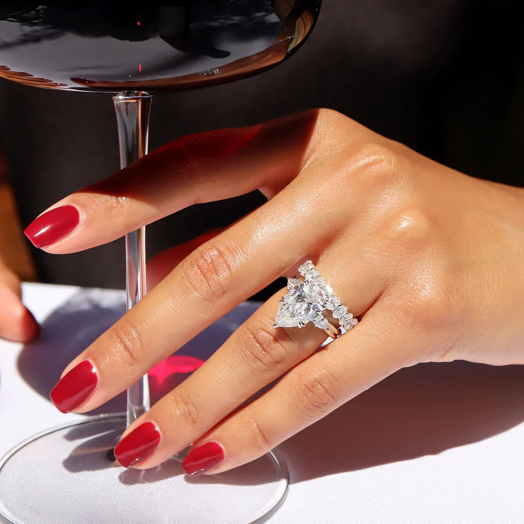 7 Carat Pear Cut Diamond Three Stone Ring with Accent Pear Diamonds