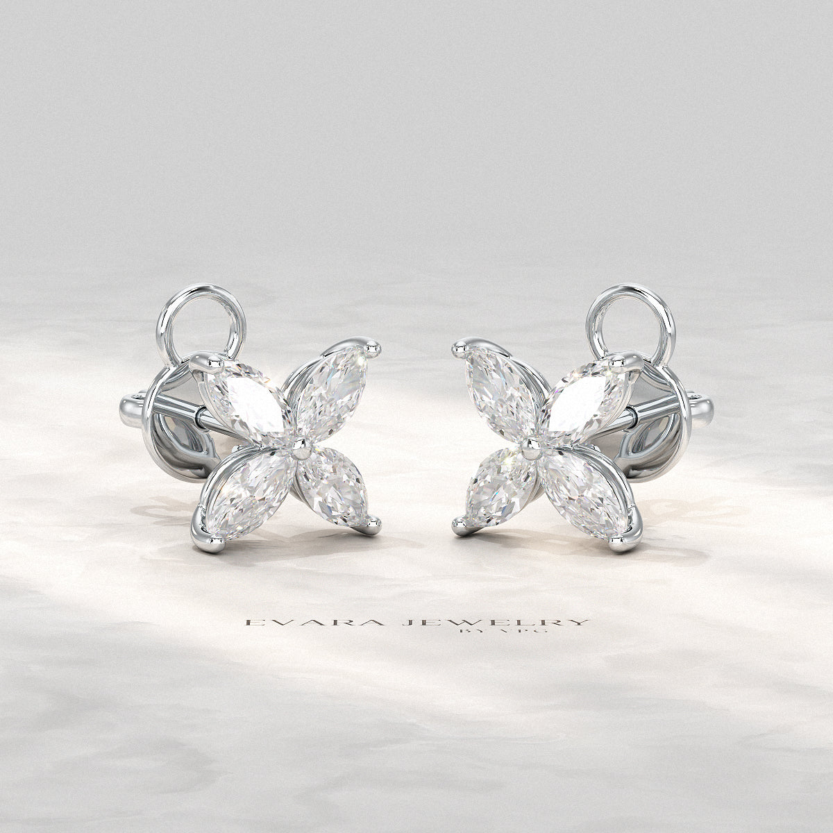 "Pair of floral stud earrings crafted with lab-grown marquise cut diamonds"