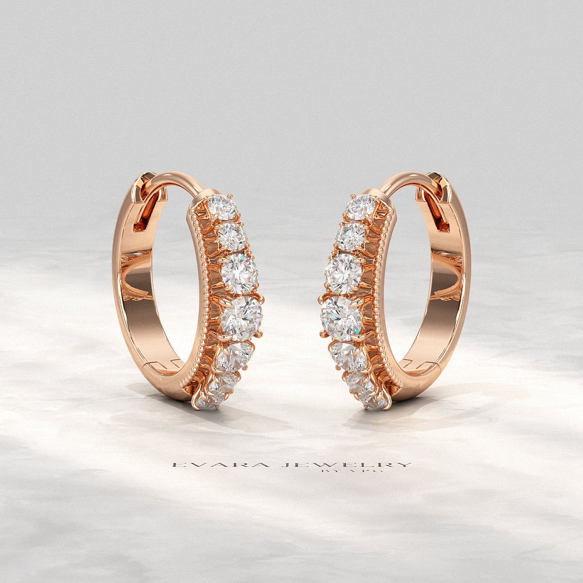 Fine jewelry hoop earrings made with graduated lab grown diamonds.  