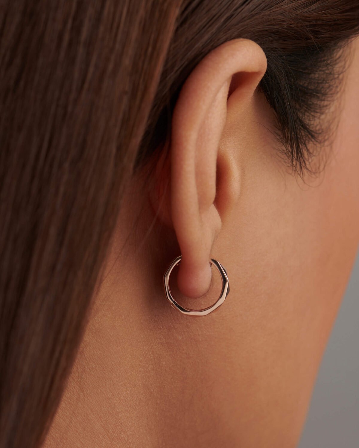 Gold-plated geometric hoop earrings with clean lines
