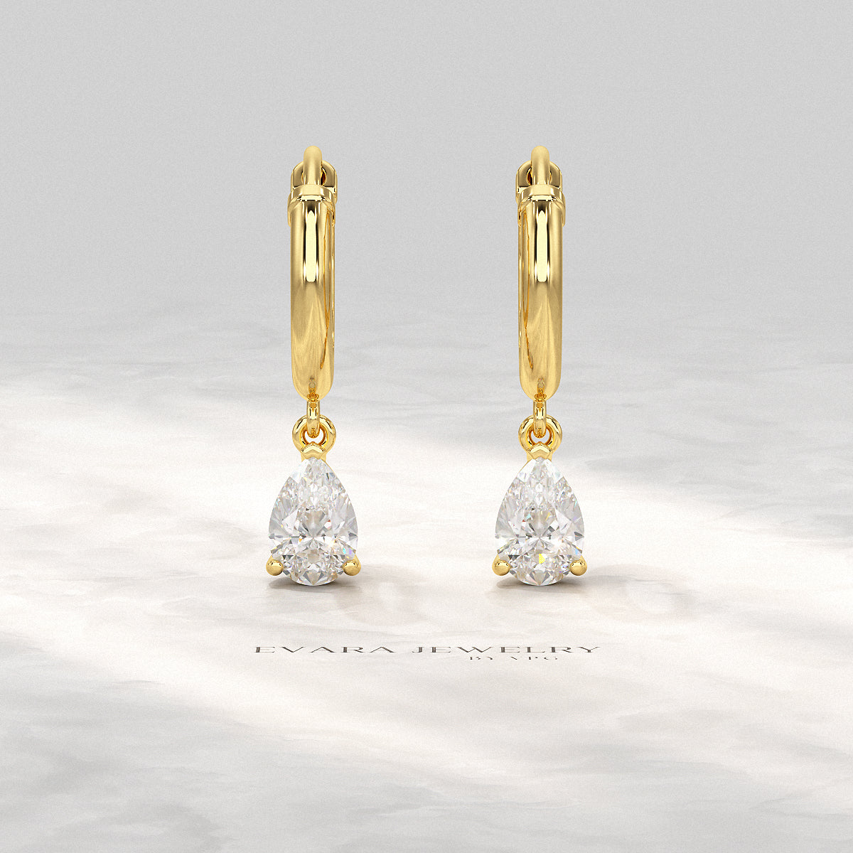 Luxury pear cut lab diamond earrings in hoop design