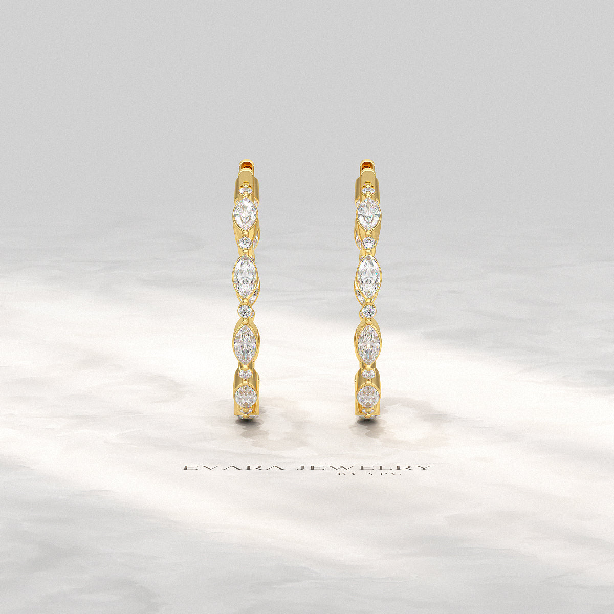 Gold hoop earrings with 10 gemstones in Morse Code pattern
