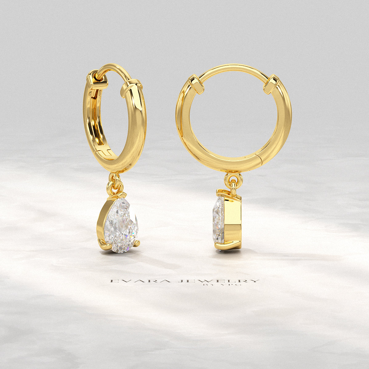Rose gold hoop earrings featuring pear shaped lab-created diamonds
