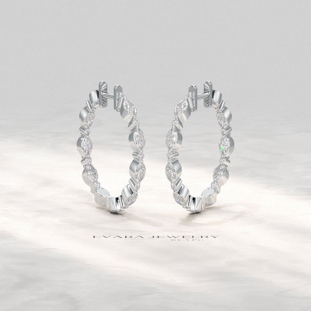 Side angle showing the thickness and stone arrangement of Morse Code hoop earrings.